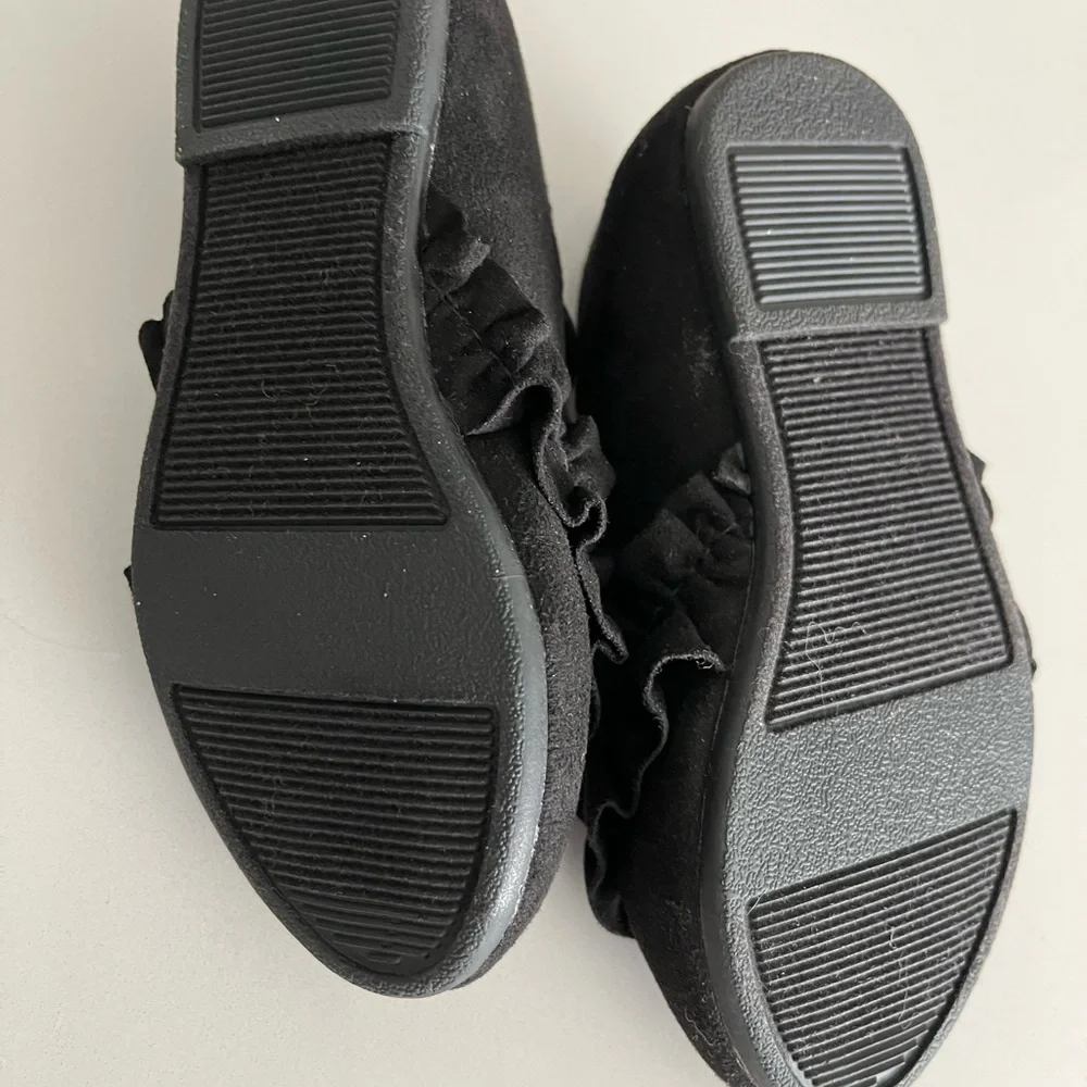 Baby girl boots and black suede dress shoes